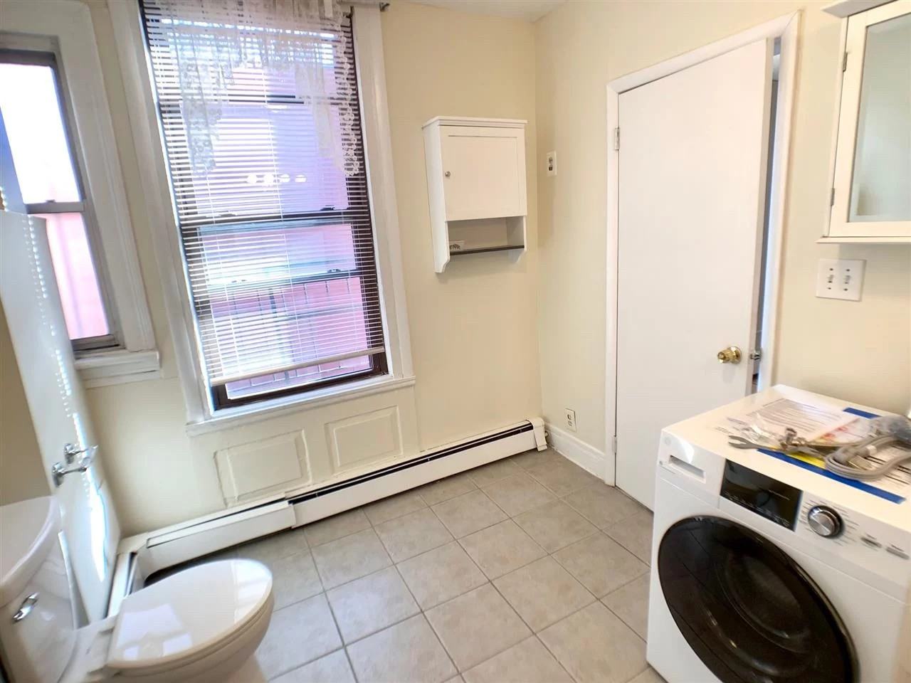 329 Grand St - Photo 4 of 16