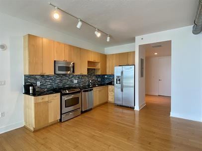 7609-11 South Essex Avenue - Photo 4 of 20