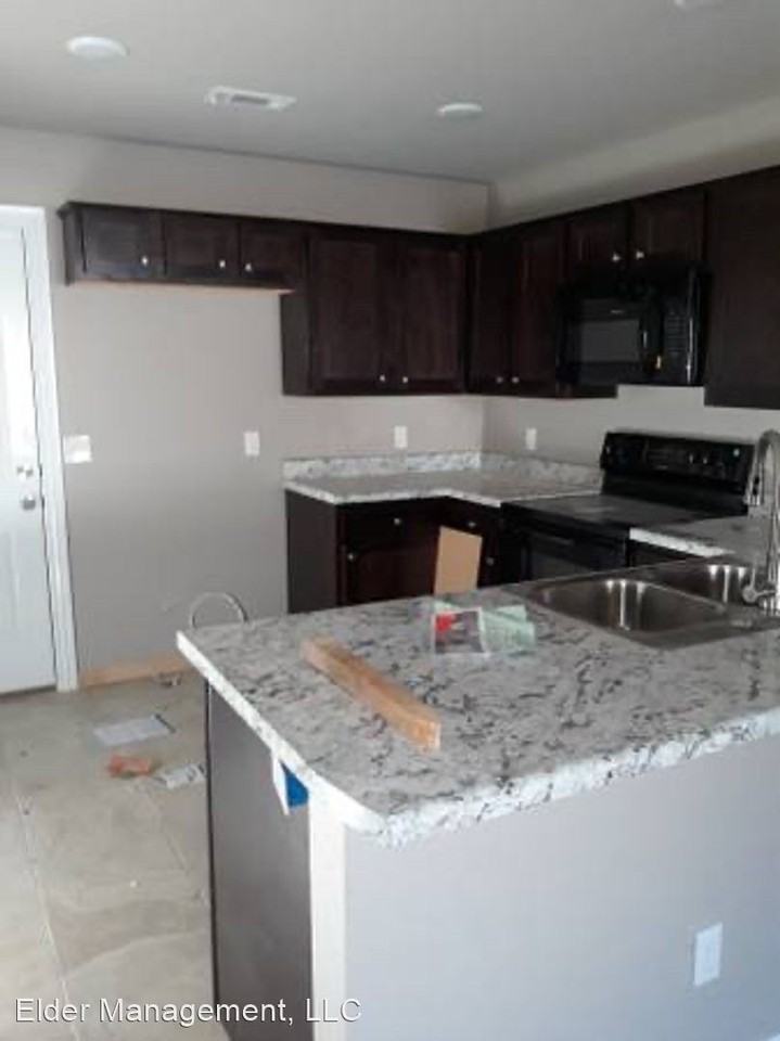 Gravette Duplexes - Photo 3 of 8