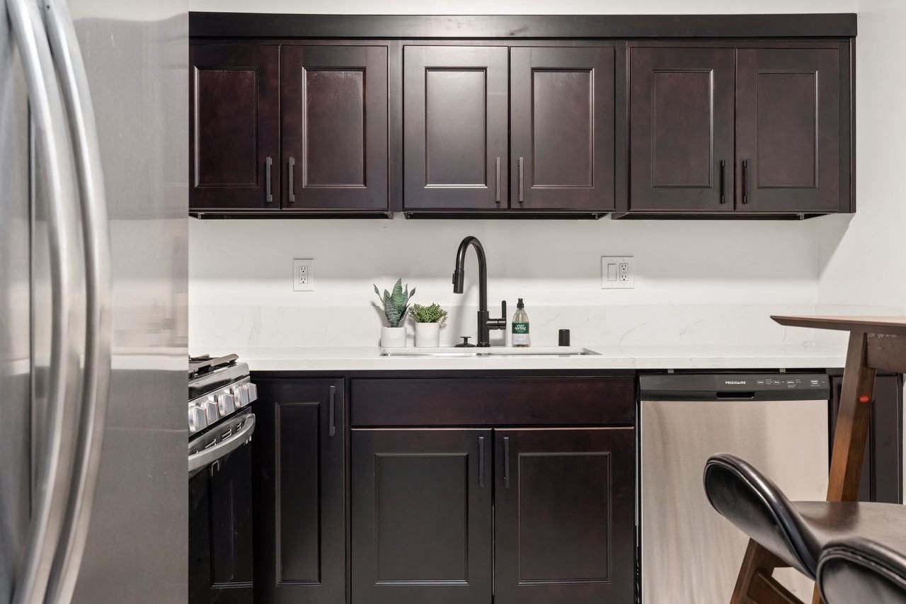 A 4 bedroom, 3 bathroom apartment with a dining room & a fully functional kitchen at 10793 Ohio Ave. - Photo 3 of 49