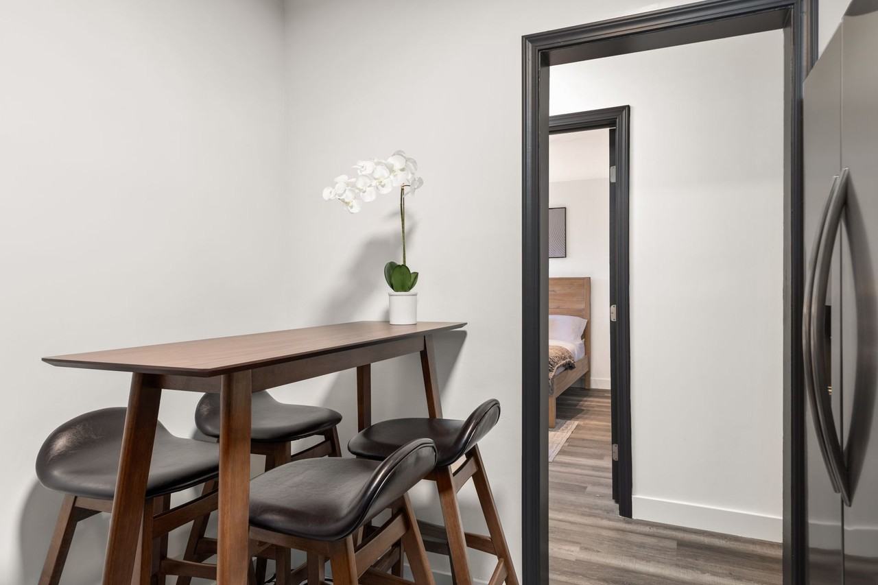 A 4 bedroom, 3 bathroom apartment with a dining room & a fully functional kitchen at 10793 Ohio Ave. - Photo 4 of 49