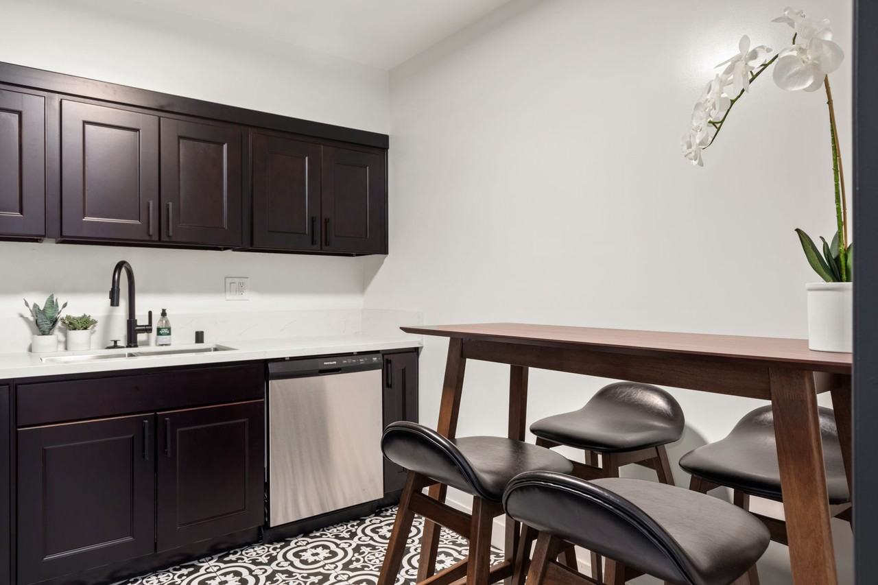 A 4 bedroom, 3 bathroom apartment with a dining room & a fully functional kitchen at 10793 Ohio Ave. - Photo 5 of 49