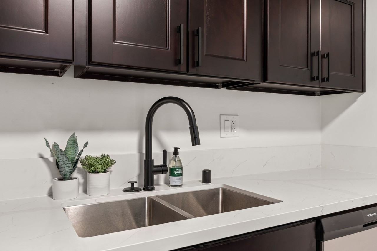 A 4 bedroom, 3 bathroom apartment with a dining room & a fully functional kitchen at 10793 Ohio Ave. - Photo 7 of 49