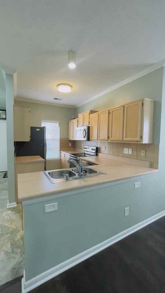 1777 Grand Bay Dr #1 - Photo 5 of 17