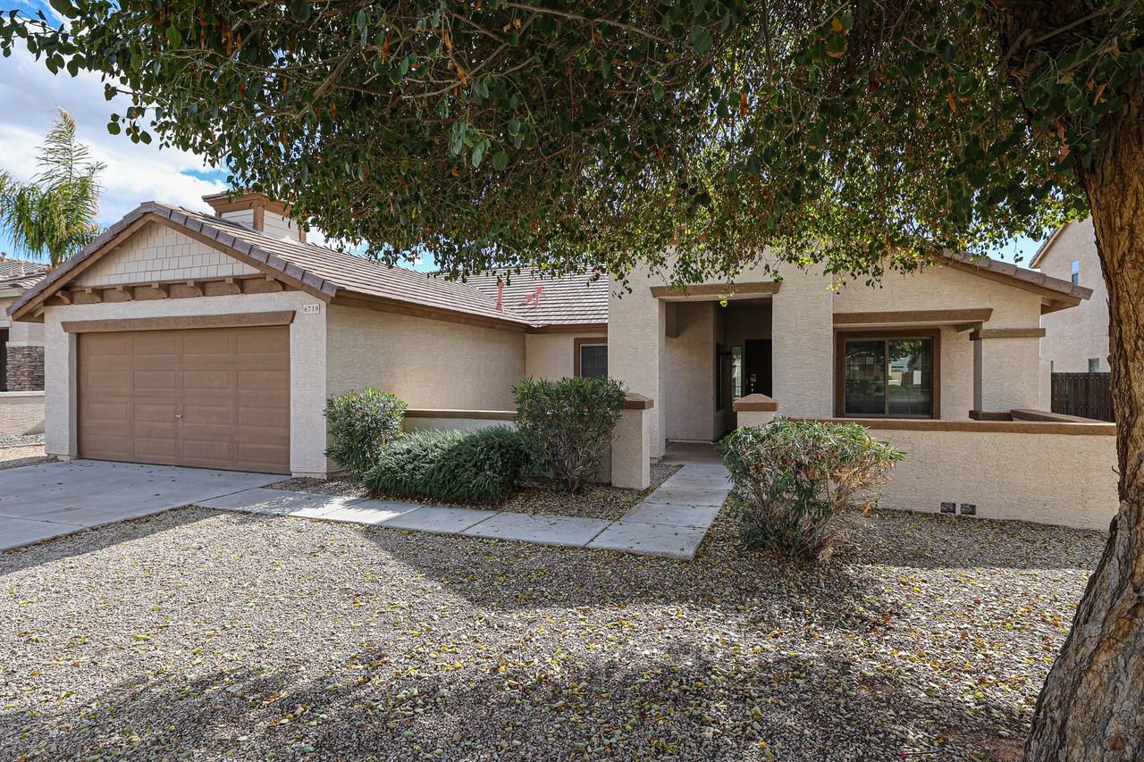 6718 S Garnet Way - Photo 2 of 38