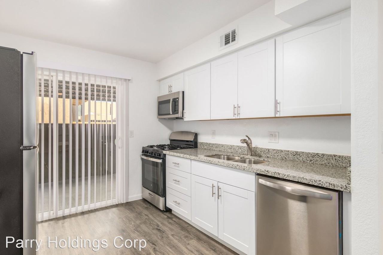 Marcus Holdings LLC dba Stadio 6012 W Oregon Ave - Photo 2 of 13