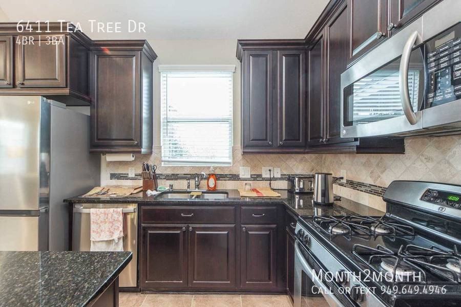 6411 Tea Tree Dr - Photo 7 of 24