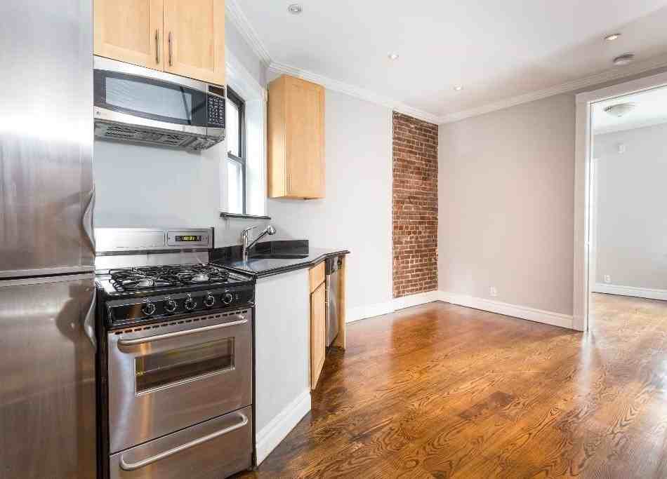 E 23rd St #16 - Photo 3 of 5