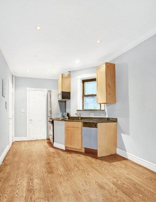 E 23rd St #16 - Photo 2 of 5