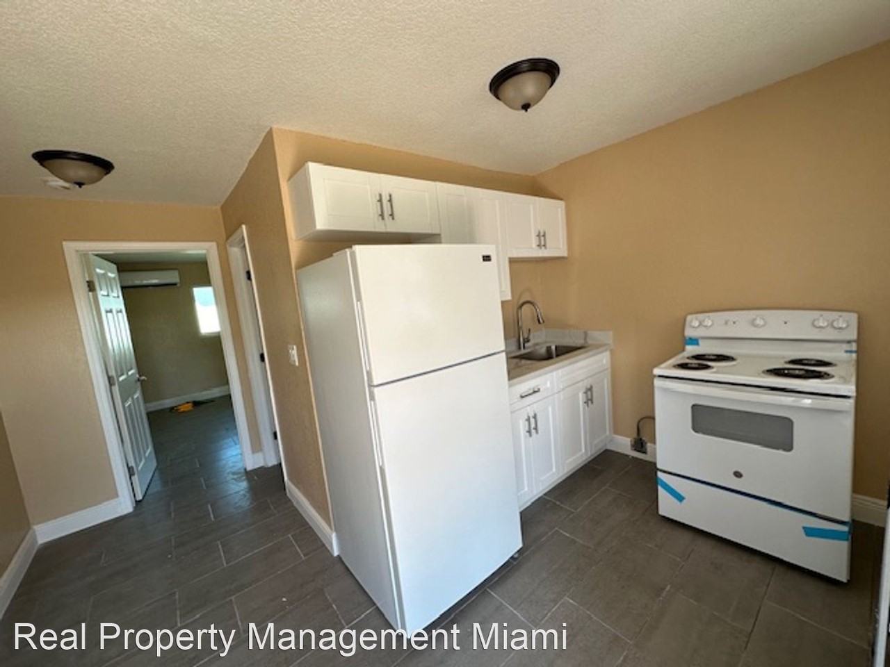 2938 NW 61 ST - Photo 2 of 4