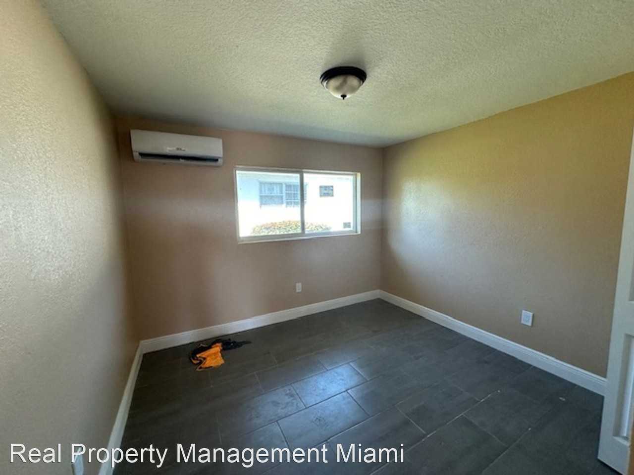 2938 NW 61 ST - Photo 3 of 4