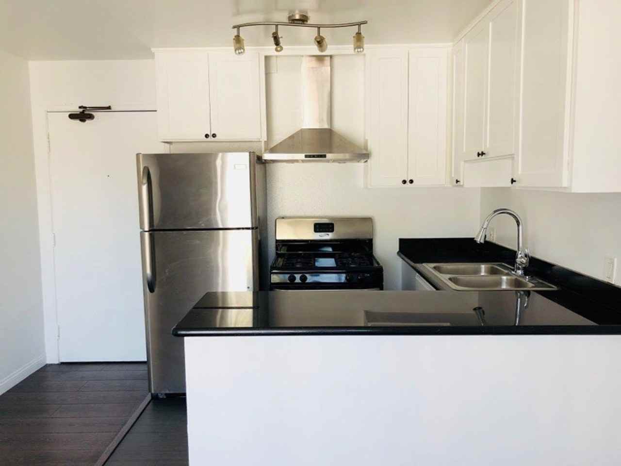 Playa Palms Apartments LLC - Photo 6 of 50