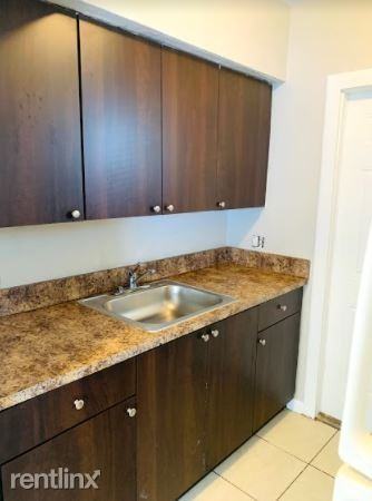 1265 SW 6th St - Photo 3 of 12