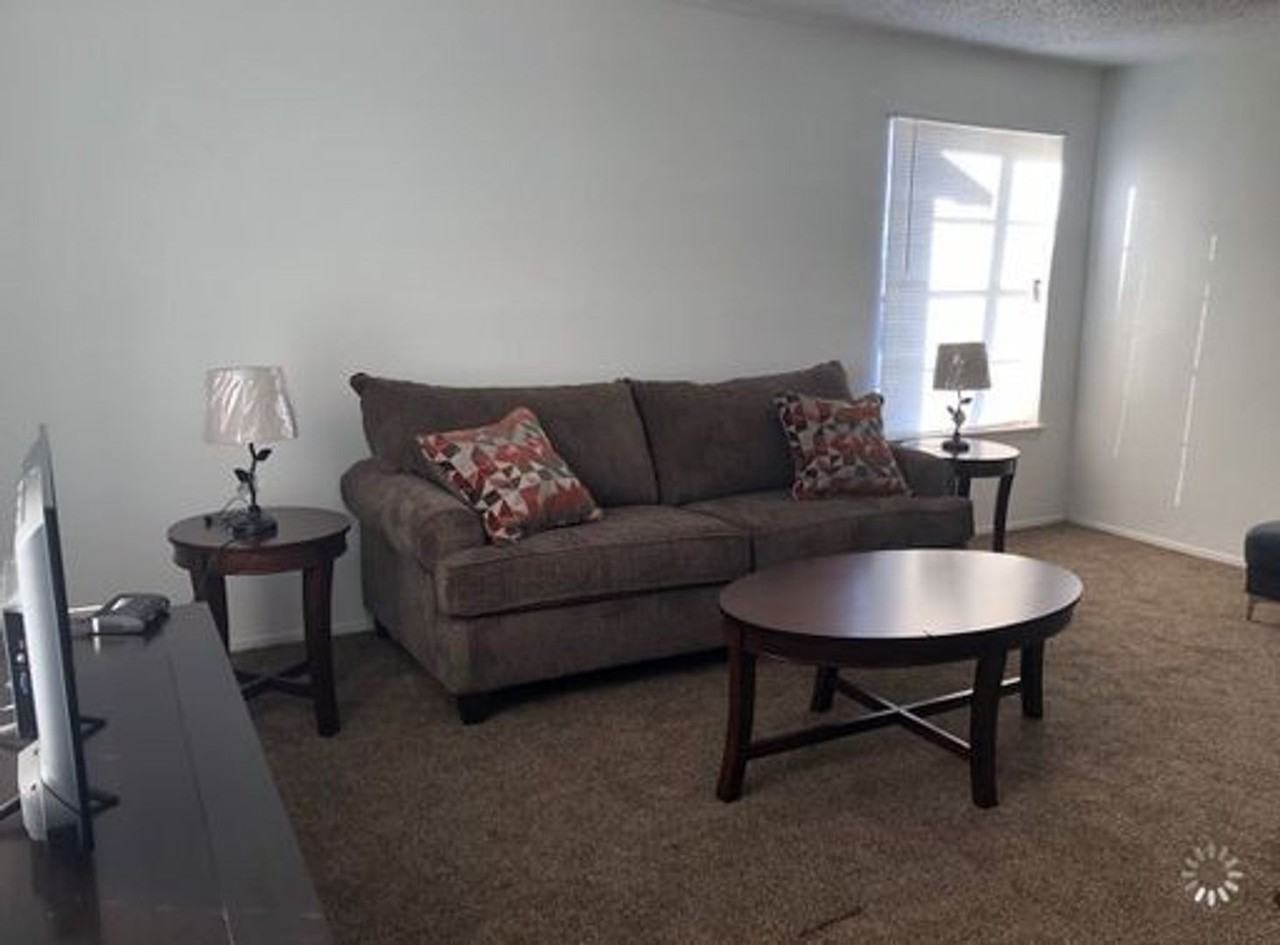 CARRIAGE HOUSE APARTMENTS - Photo 3 of 17