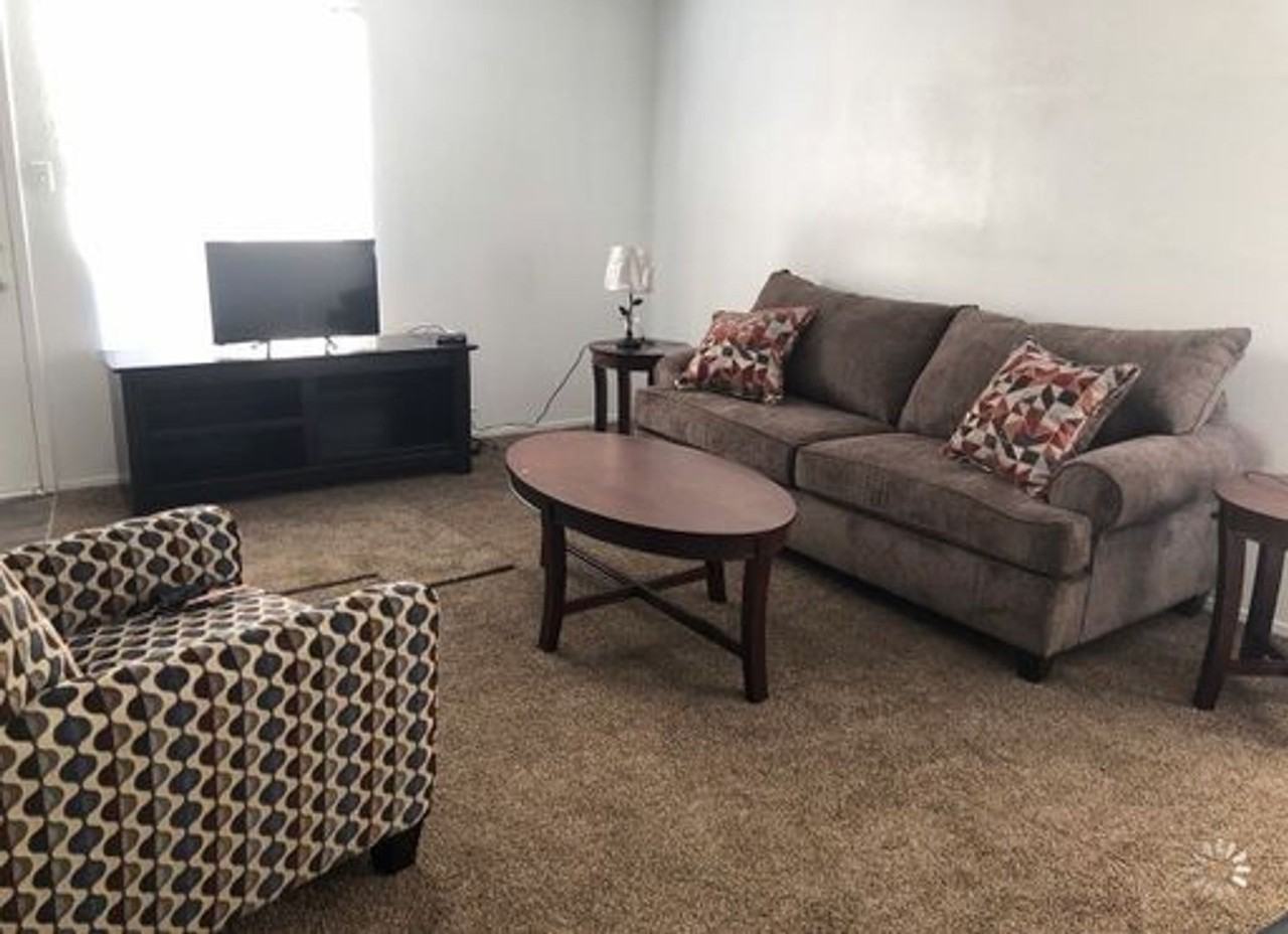 CARRIAGE HOUSE APARTMENTS - Photo 5 of 17