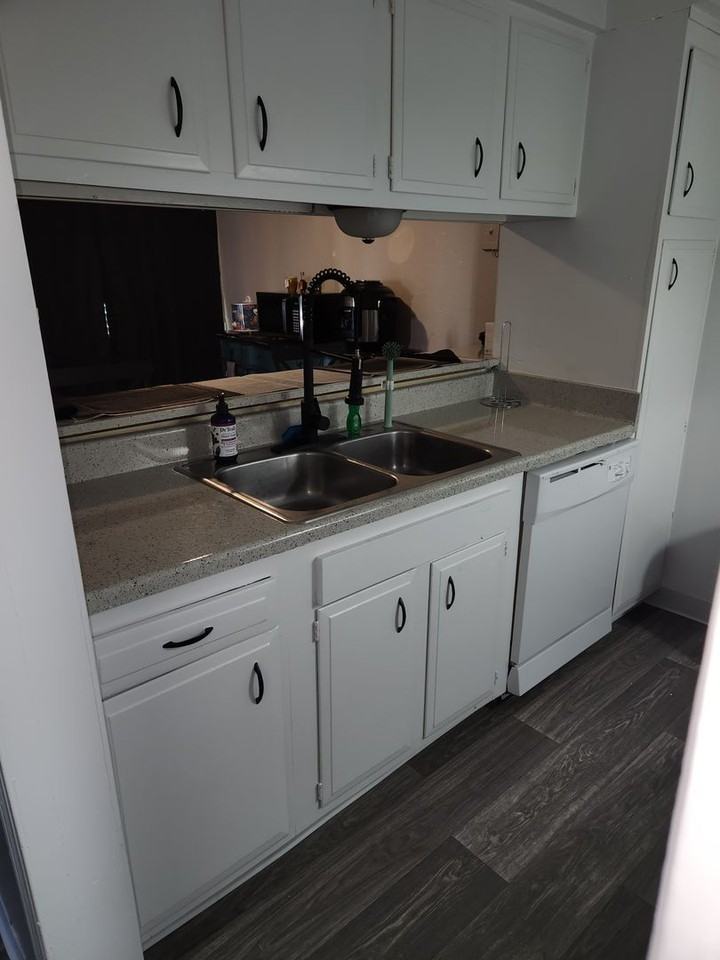 R Apartments LLC - Photo 2 of 12