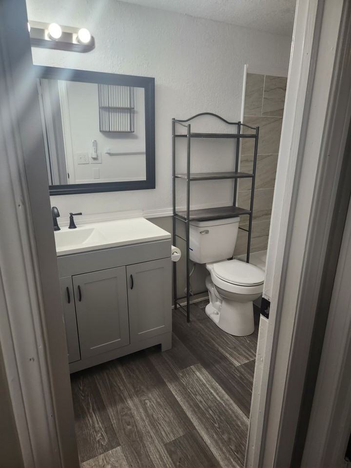 R Apartments LLC - Photo 3 of 12