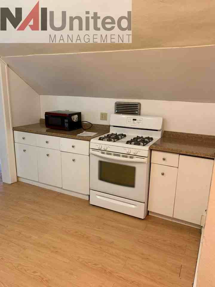 Schouten-S Fairmount Duplex - Photo 2 of 6