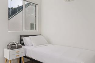 A 5 bedroom, 3 bathroom apartment with common areas and a fully functional kitchen at 1740 Kelton Ave. - Photo 1 of 1