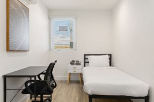 A 5 bedroom, 3 bathroom apartment with common areas and a fully functional kitchen at 1740 Kelton Ave. - Photo 1 of 1