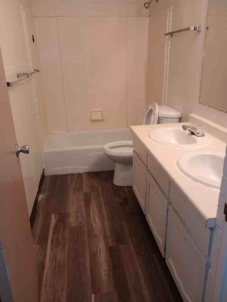 THE QUADS APARTMENTS - Photo 3 of 7