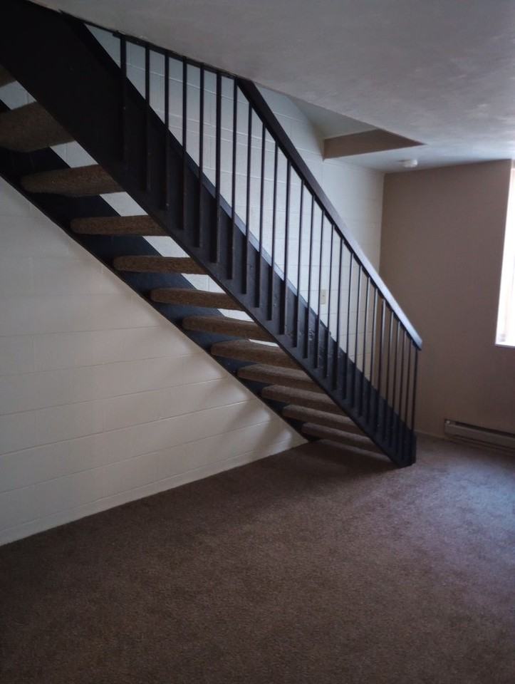 THE QUADS APARTMENTS - Photo 7 of 7