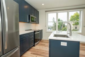 featured image of 102 W 6th St