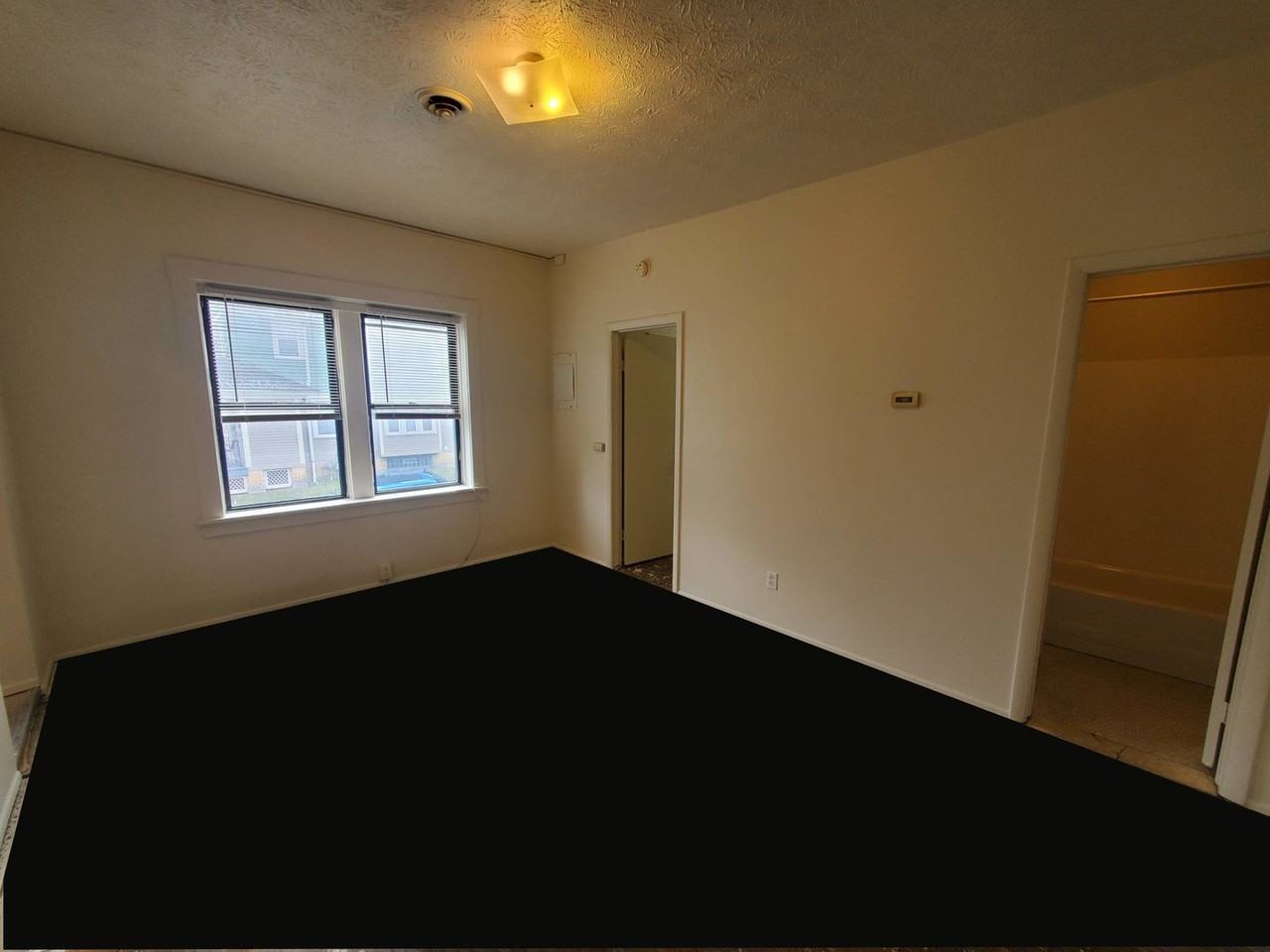 1009-1013 Genesee St - Photo 3 of 5