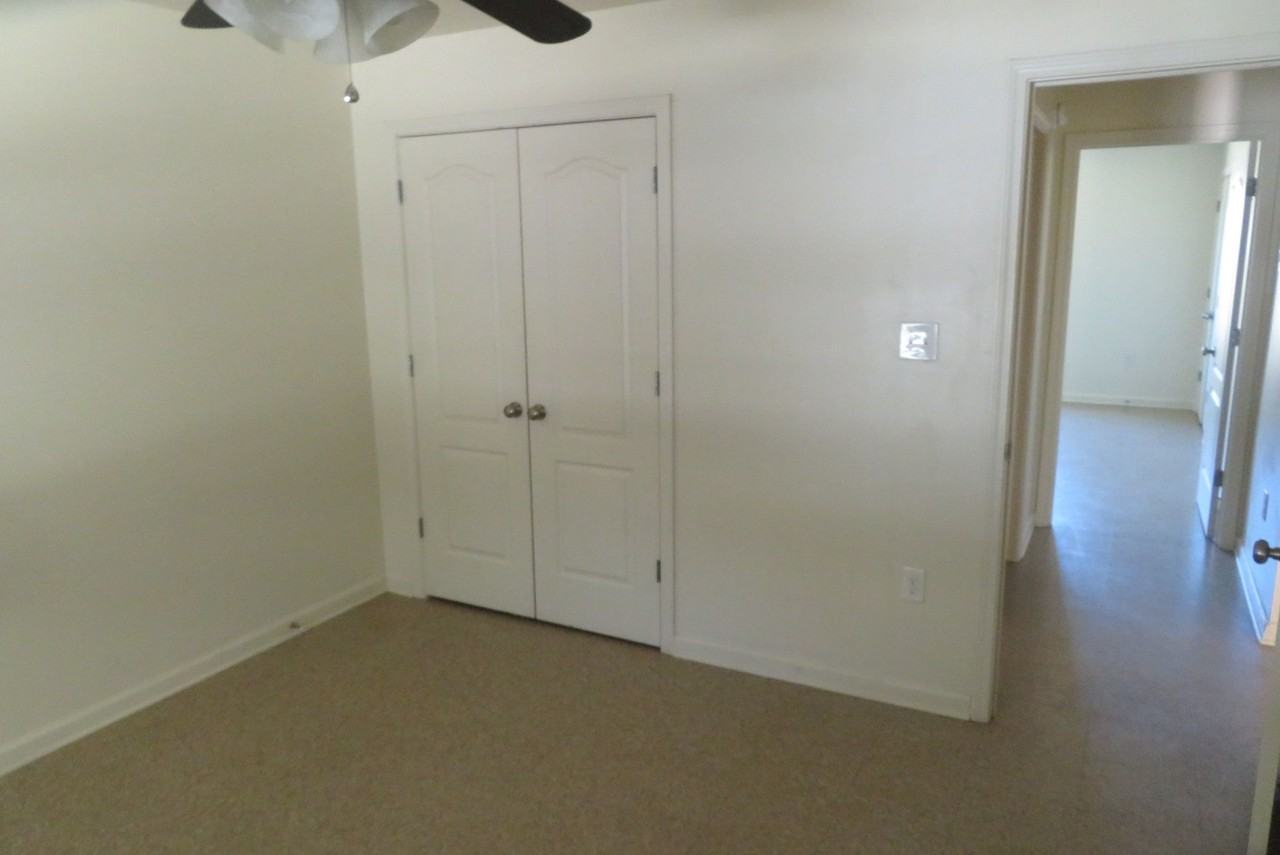 COUNTRY APARTMENTS - Photo 3 of 8