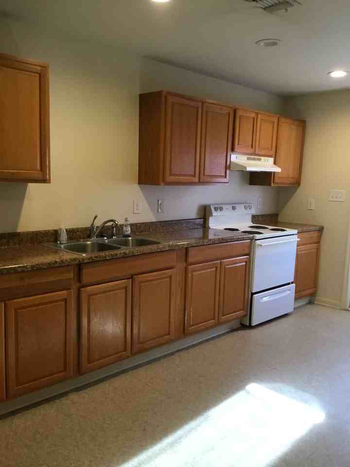 COUNTRY APARTMENTS - Photo 6 of 8