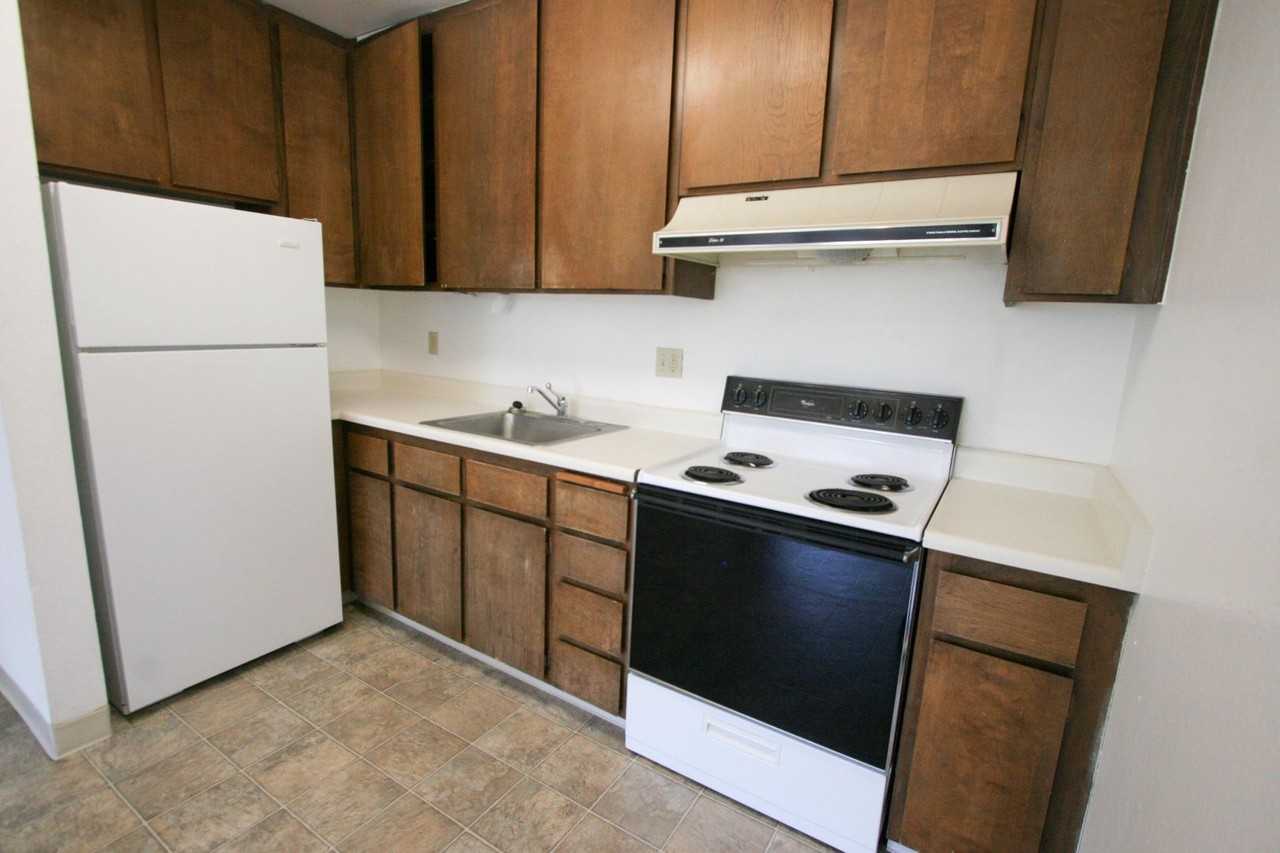 Viking Apartments LLC - Photo 4 of 31