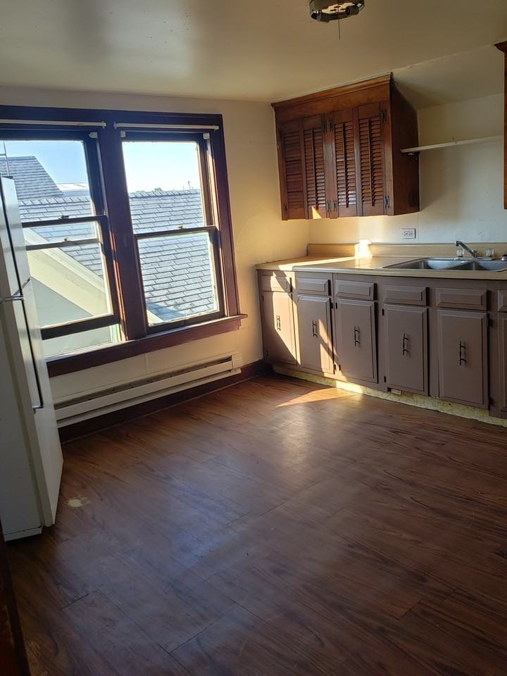 1411 & 1411 1/2 Milan Avenue - Photo 2 of 4