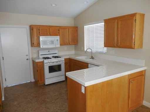 7411 Windrose Dr - Photo 2 of 3