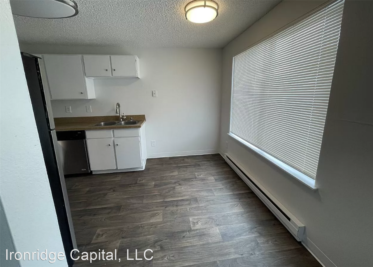 Free Rent in March!* Updated 1 & 2 Bedroom Apartments in Tacoma - Photo 2 of 11