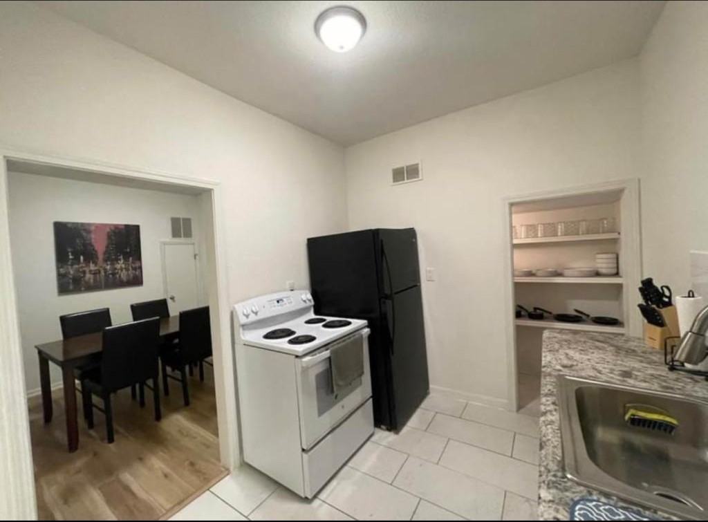 1205 E English St - Photo 2 of 12