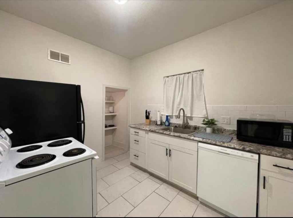 1205 E English St - Photo 3 of 12