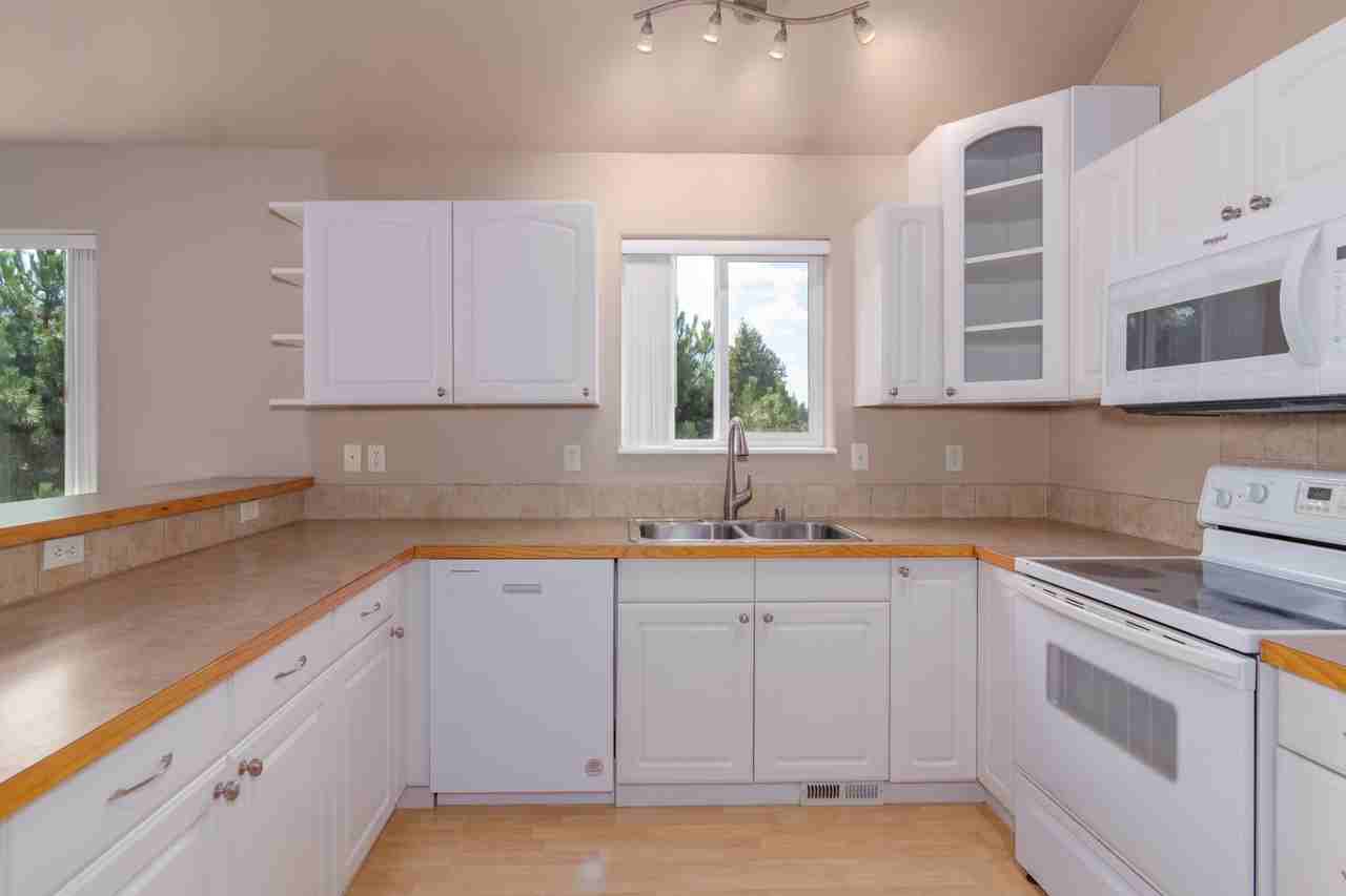 Spacious 4 bed 3 Bath home built 2005 in Mead School District - Photo 3 of 29