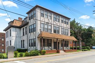 Charming Tudor Apartments on Walnut Street - Photo 1 of 1