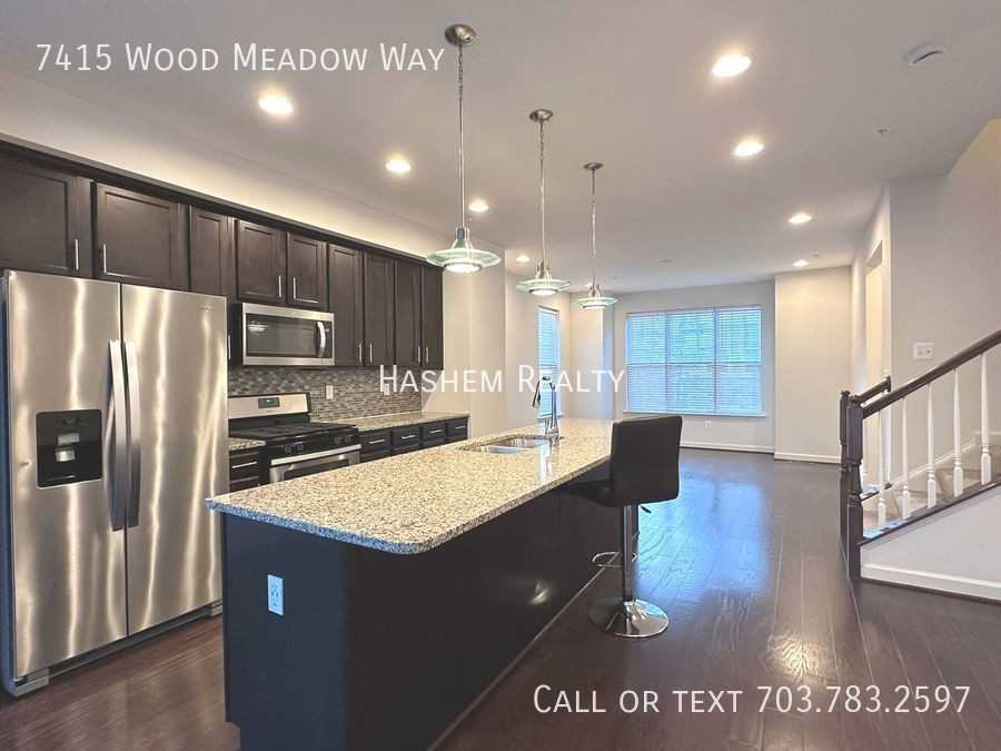 7415 Wood Meadow Way - Photo 3 of 39