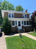 featured image of 114 E 1st St