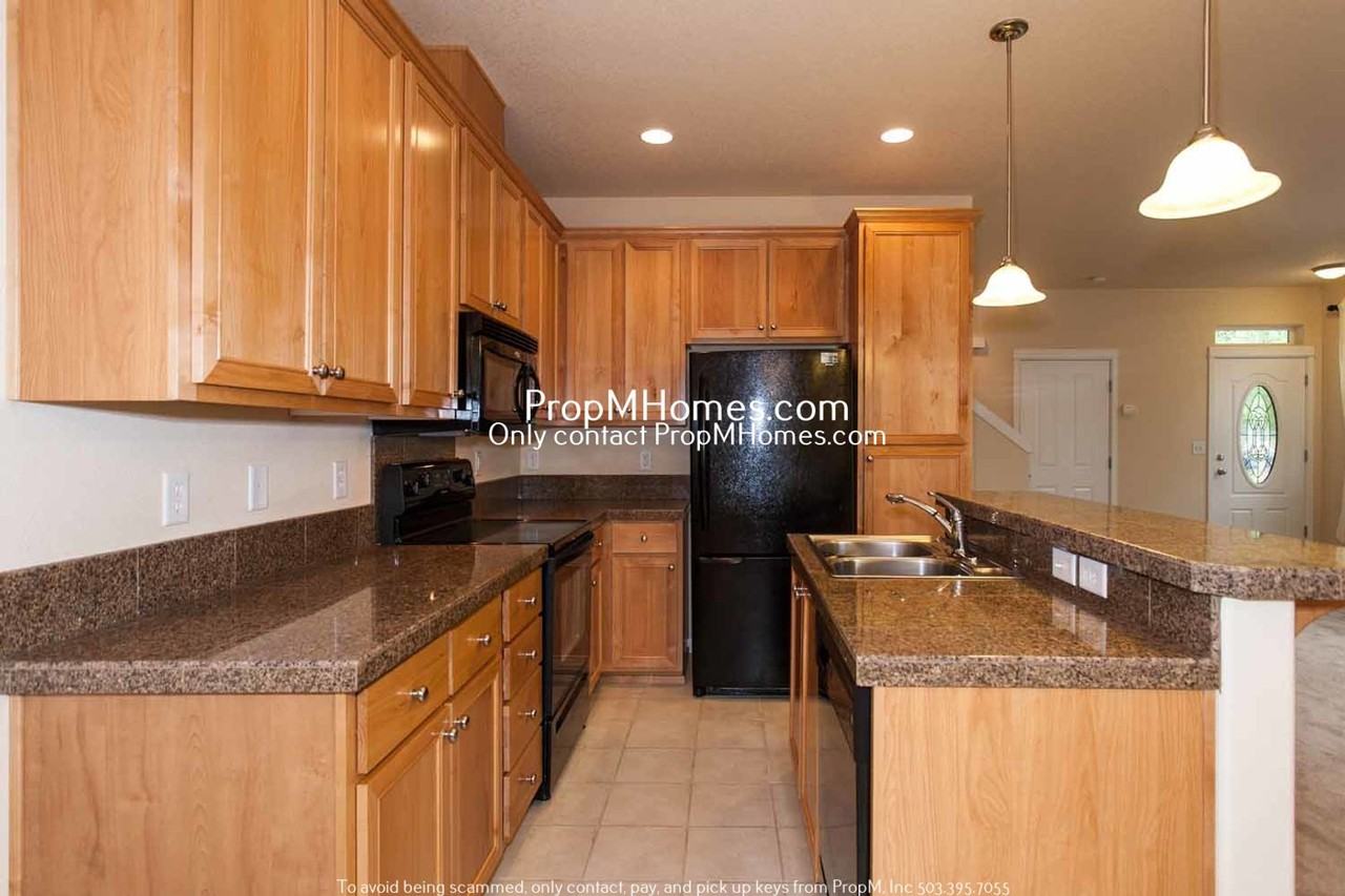 868 Nw Council Dr - Photo 7 of 16