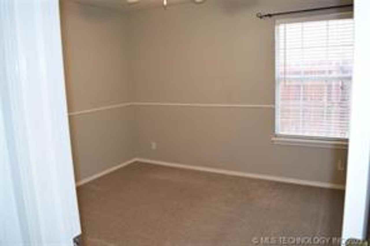 13609 E 90th Ct N - Photo 2 of 16