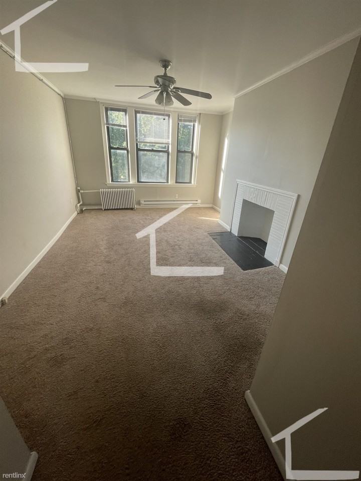 48 JFK St - Photo 3 of 7