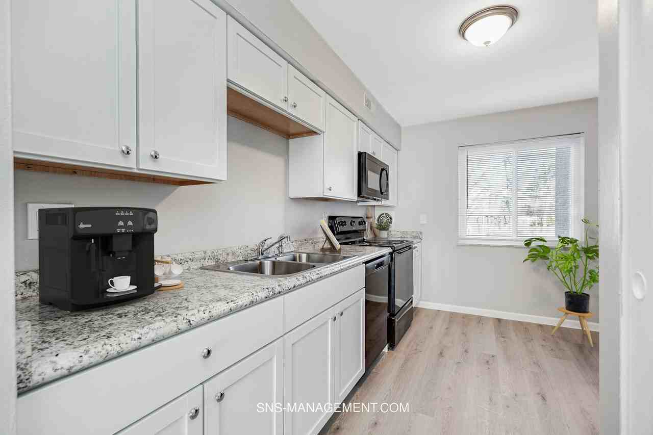 Woodmere Apartments - Photo 4 of 40