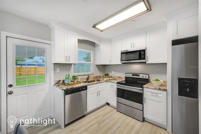 4673 75th Ave N - Photo 3 of 14