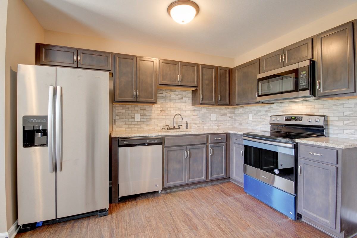 Stunning Luxury Town Homes Boasting Stainless Appliances and Modern Fixtures - Photo 3 of 9