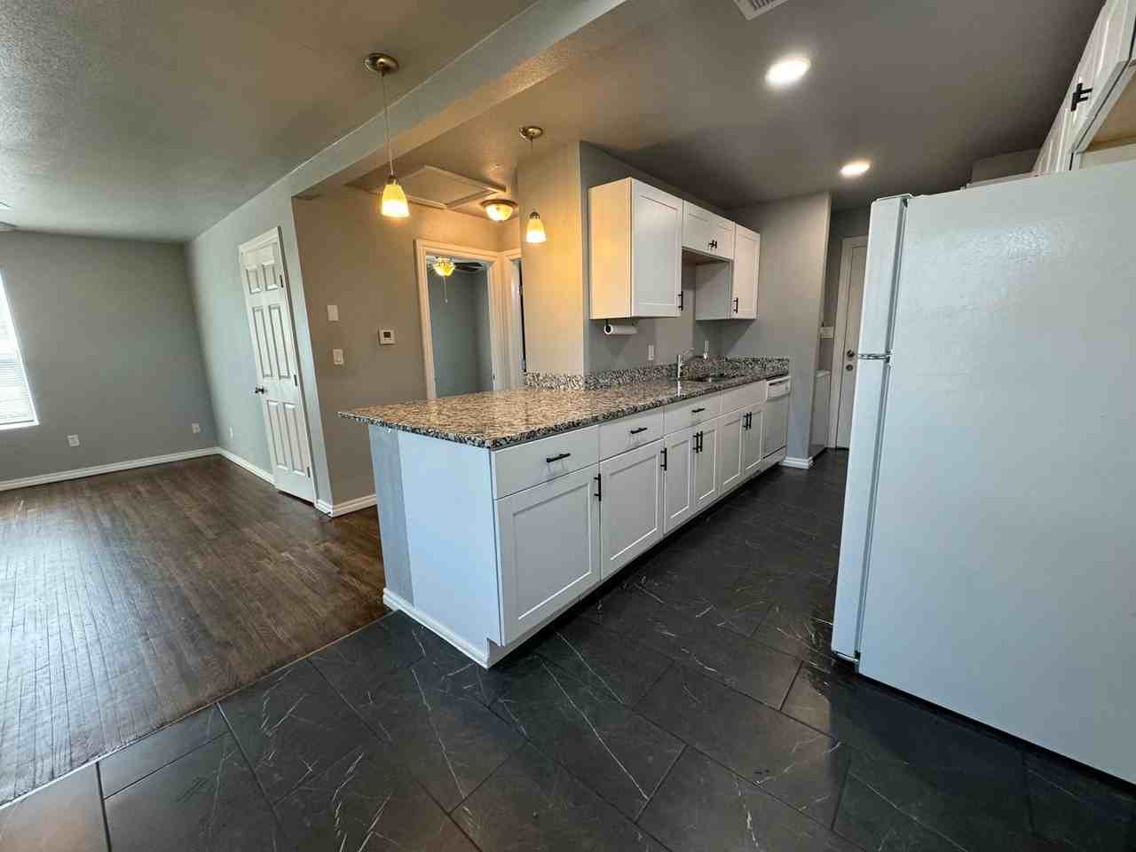 1302 N 73rd East Ave - Photo 5 of 12