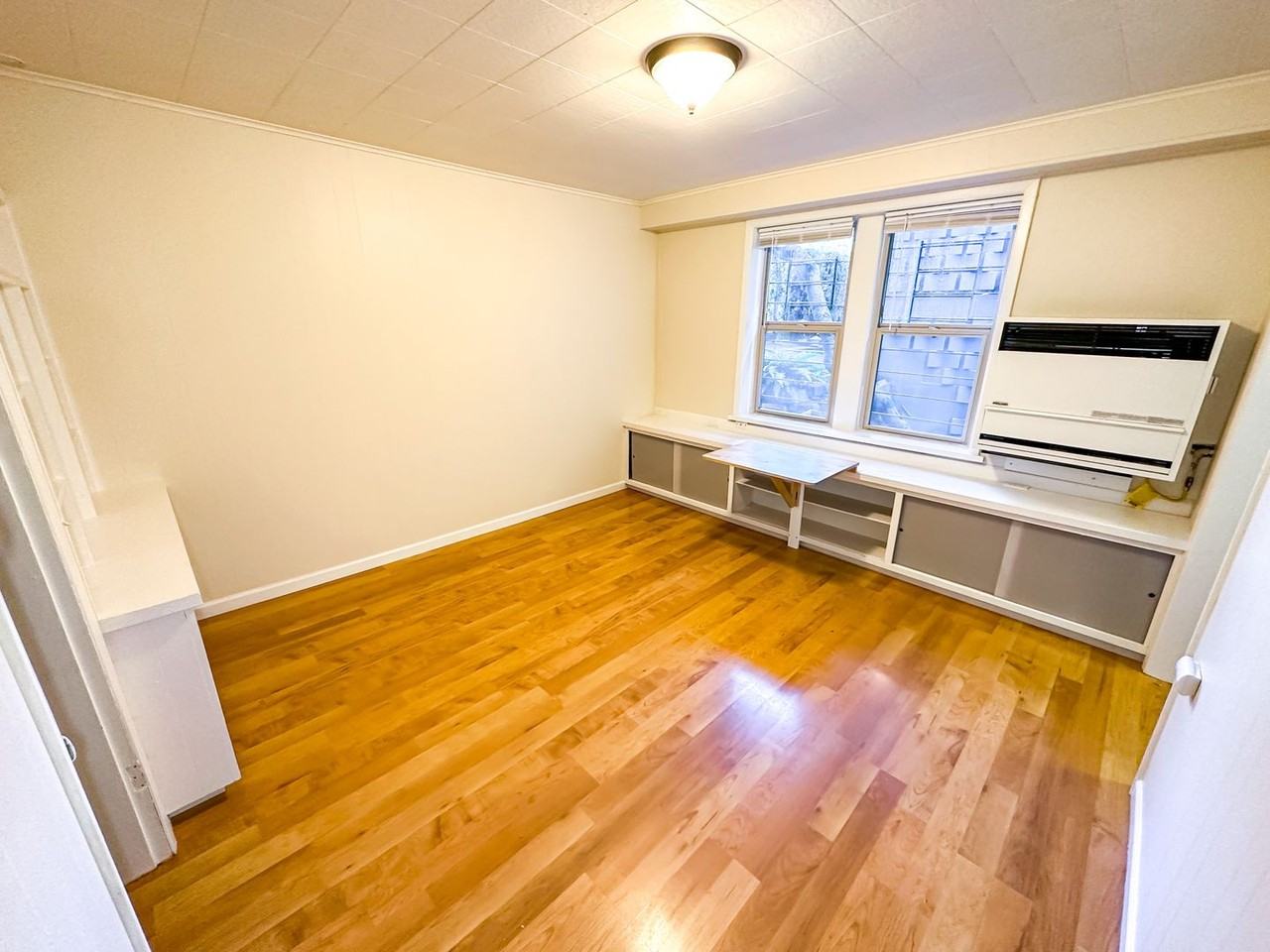 Regis Apartments - Photo 2 of 15