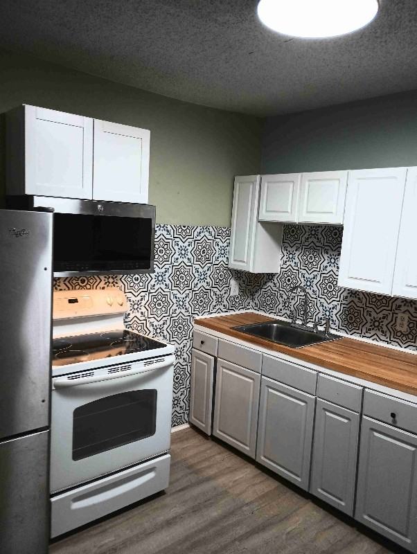 1204 W 27th St - Photo 2 of 9