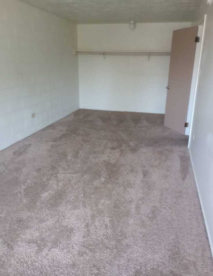 THE QUADS APARTMENTS - Photo 3 of 6